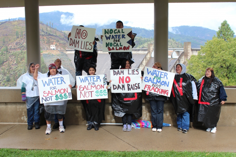 The Winnemem Wintu Tribe protests plans to raise Shasta Dam and to build the twin tunnels during a break in the rain. Photo by Dan Bacher.