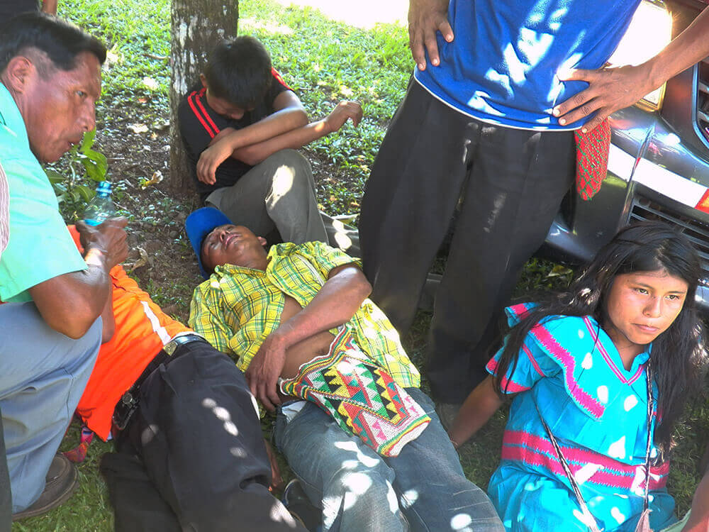Protesters, including women and children, recover after clashes with the police. (Photo: Oscar Sogandares)