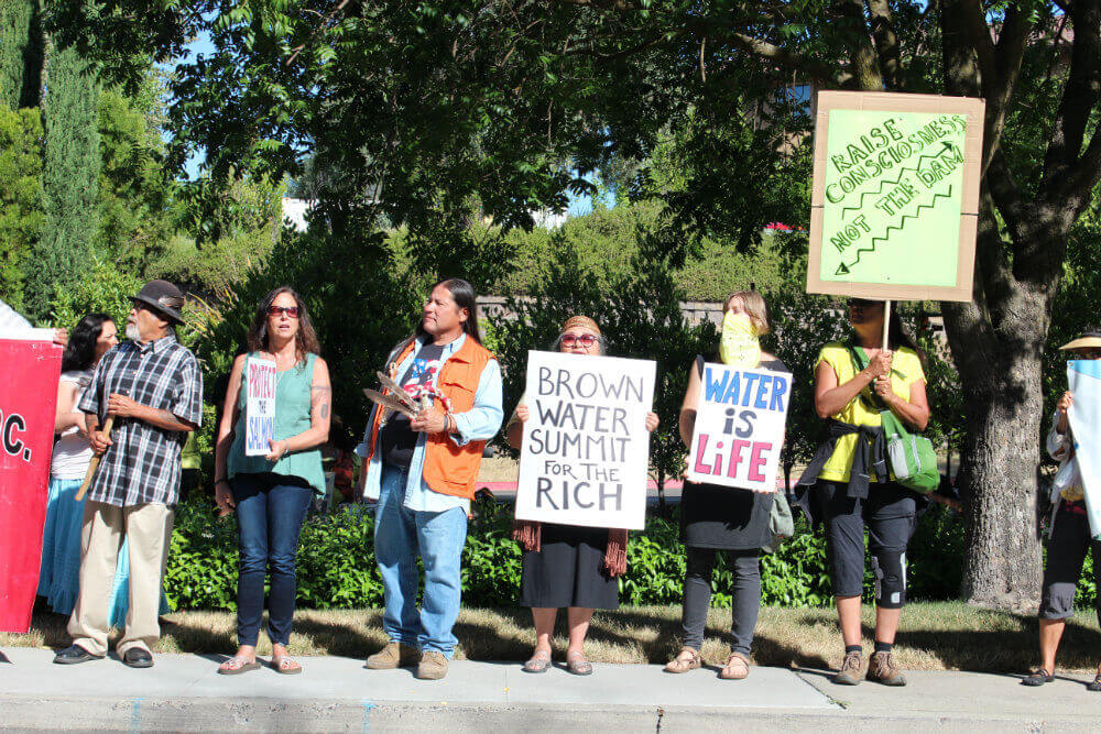 Raise Consciousness, Not The Dam! Photo by Dan Bacher.