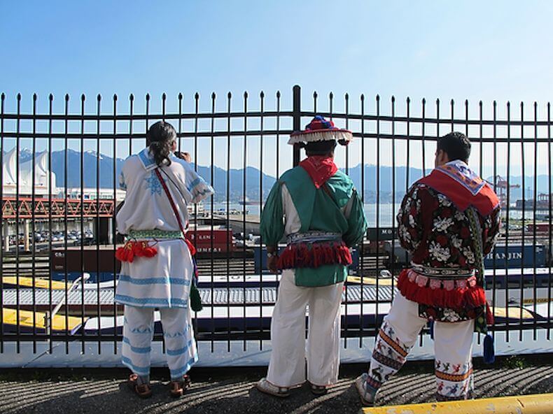 Members of the Wixarika delegation look out at the harbor in Vancouver after their meeting with First Majestic.