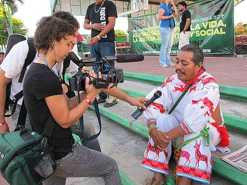 Democracy Now reporter interviews Yuka+ye at the COP 14 climate summit.