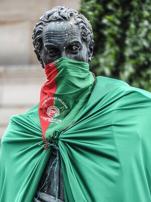 The statue of Simon Bolivar in Bogota wears indigenous colours during indigenous demonstrations in Bogota. Minga Juvenil Nacional 