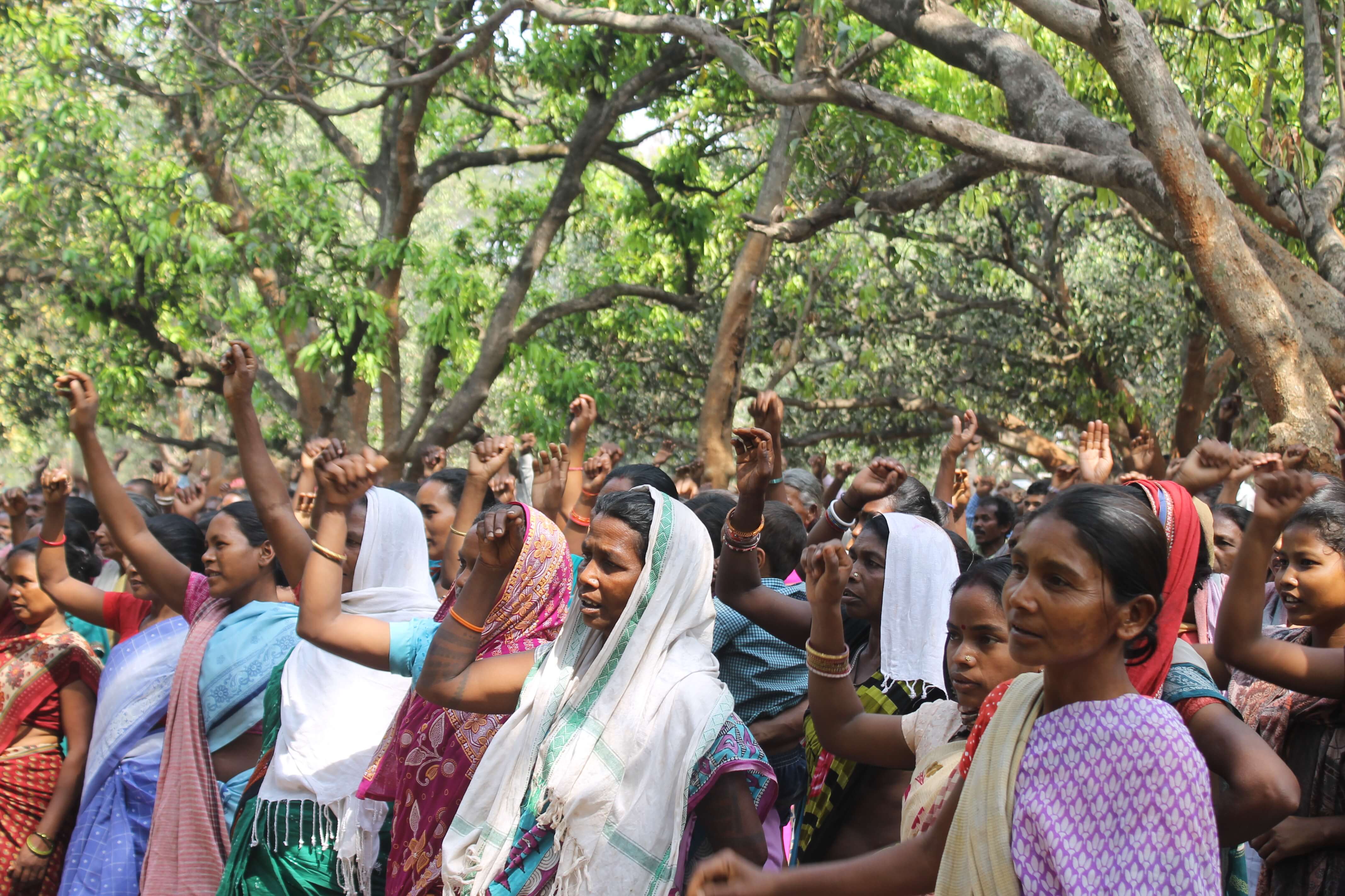 women raising slogans