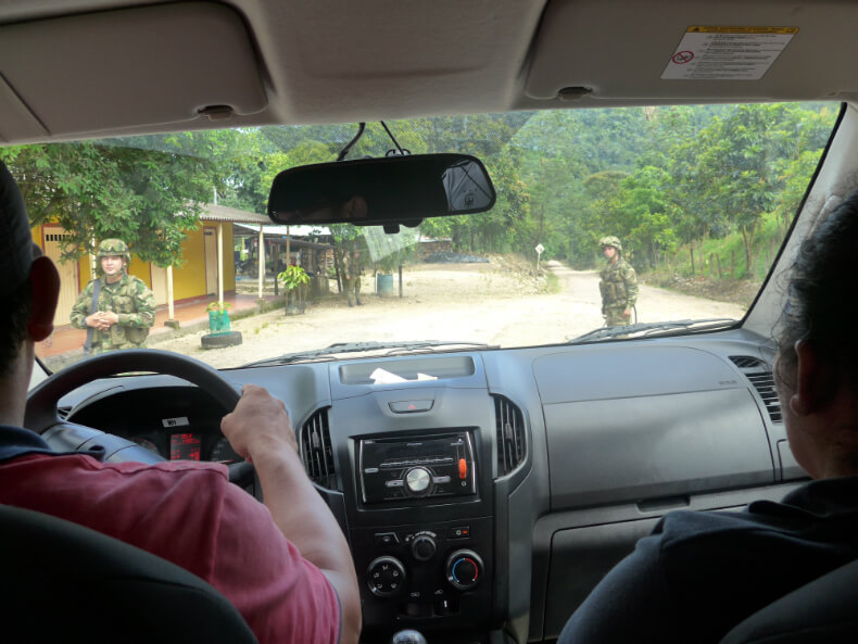 Soldiers on the road leading up to the Gibraltar I gas plant. Photo: Charlie Satow